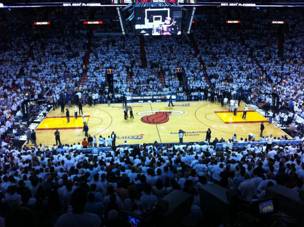 Basketball game in a crowded arena.