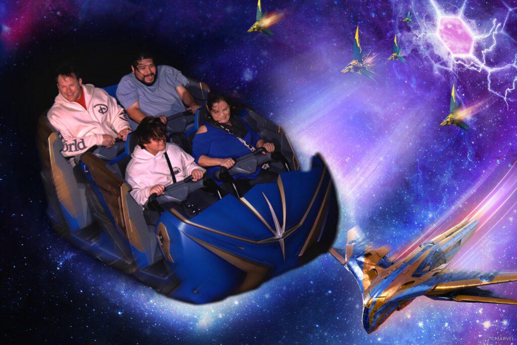Family enjoying a space-themed amusement park ride.