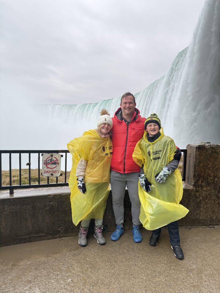 Robert W. Kuypers with Kenley and Braden beside Niagara Falls.