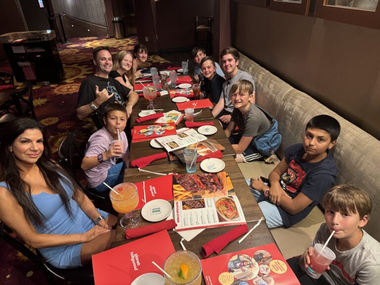 Family and friends together at the Planet Hollywood table.