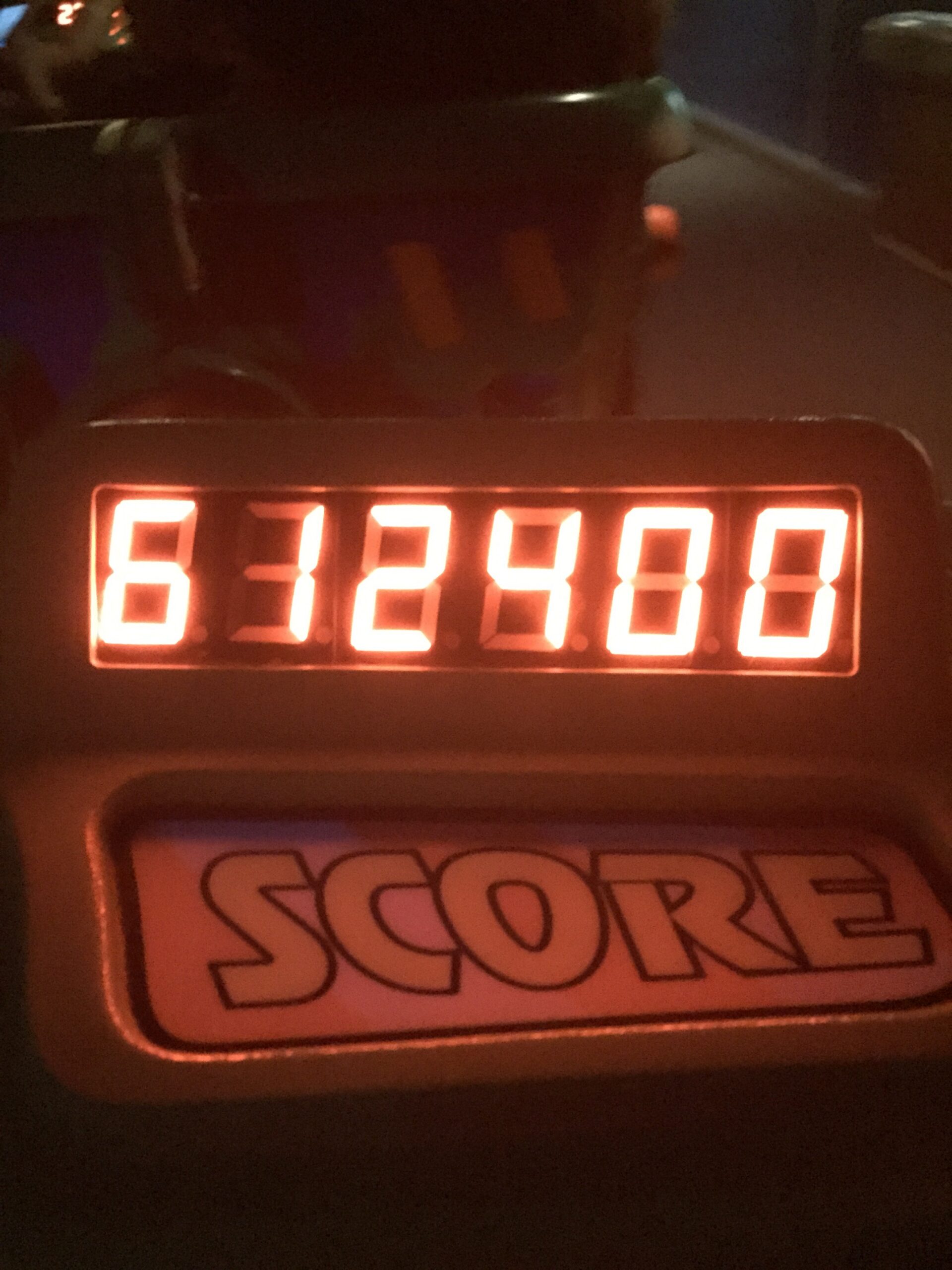 A red digital score display reading 612400.
